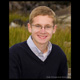 Head shot of a high school senior male by the rocky coastline of kennebunk beach kennebunk maine