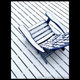 morning snow fall on deck and blue adirondak chair