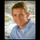 Head shot portrait of young man down by the rivers edge kennebunk maine